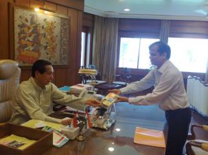 Presenting the book to H.E. The Governor of Maharashtra, Mr. S. C. Jamir